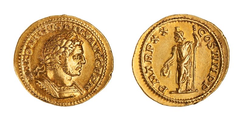 Sérapis est aisément identifiable, puisqu'il apparait toujours coiffé du modius, un instrument servant à mesurer le blé. On le voit ici au revers d'un aureus de Caracalla. [© American Numismatic Society]